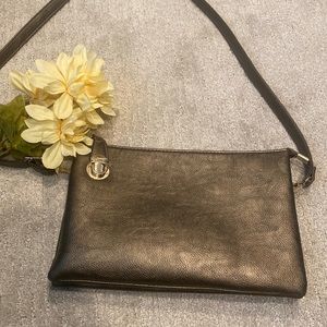 Cross body / clutch / shoulder convertible bag